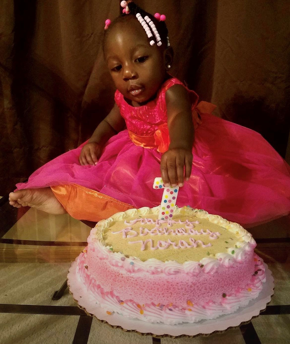 Norah with a birthday cake