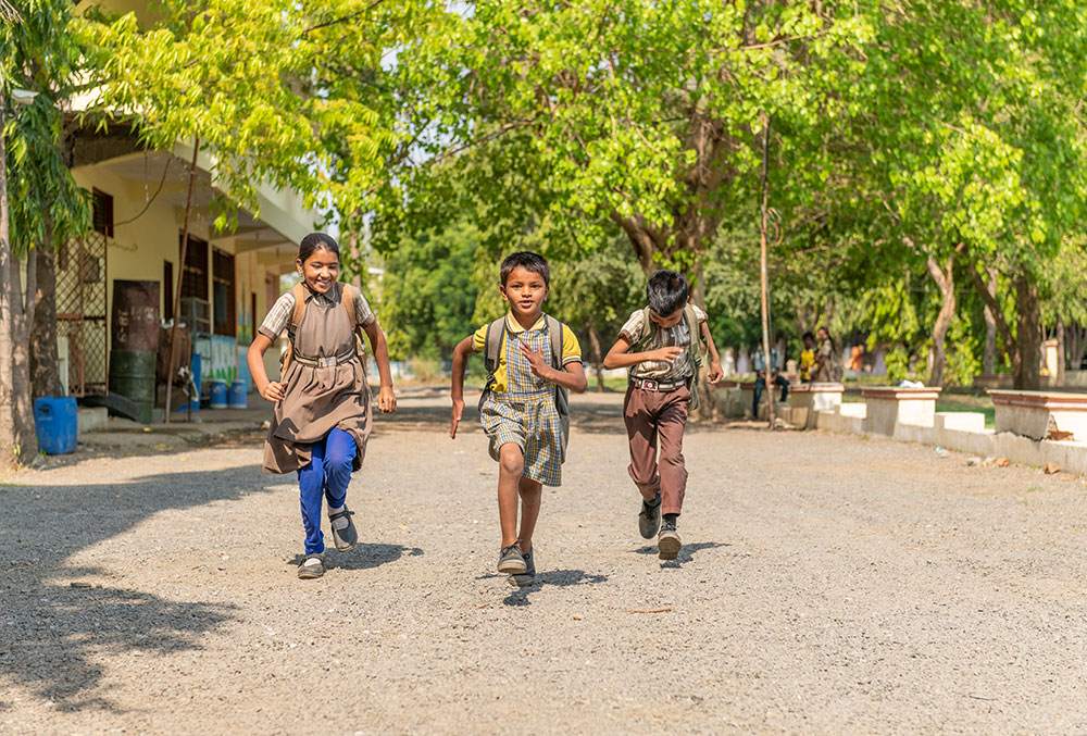 Rajesh running with his siblings