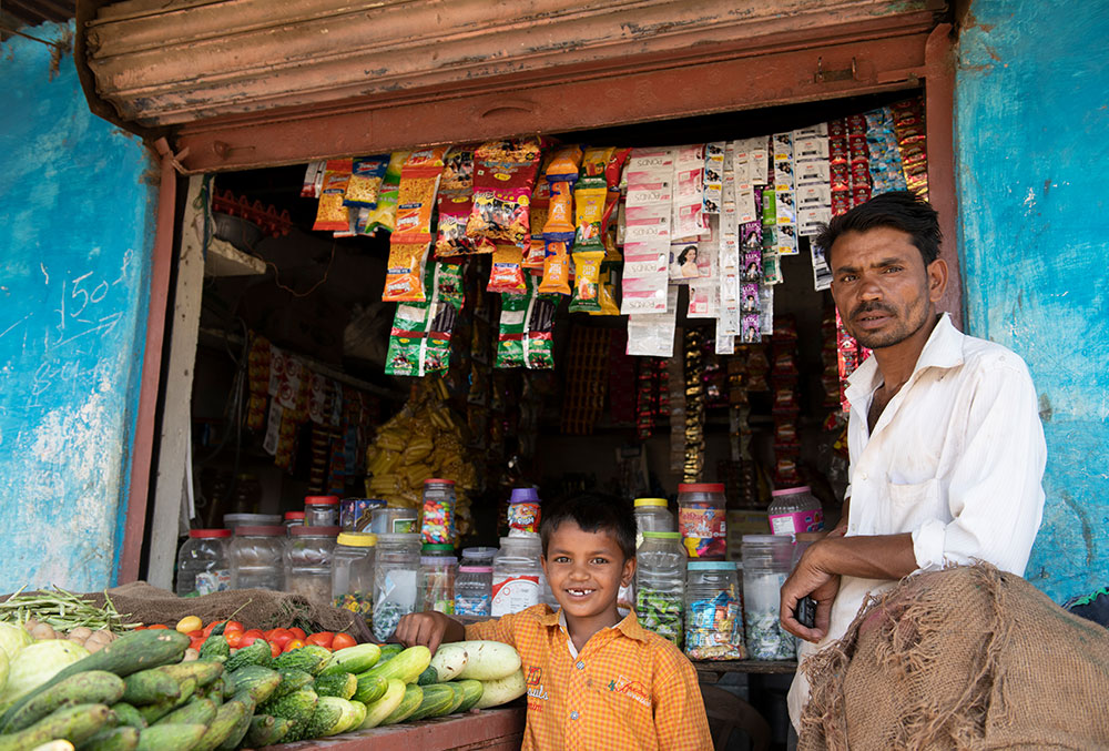Rajesh with his father at his shop.