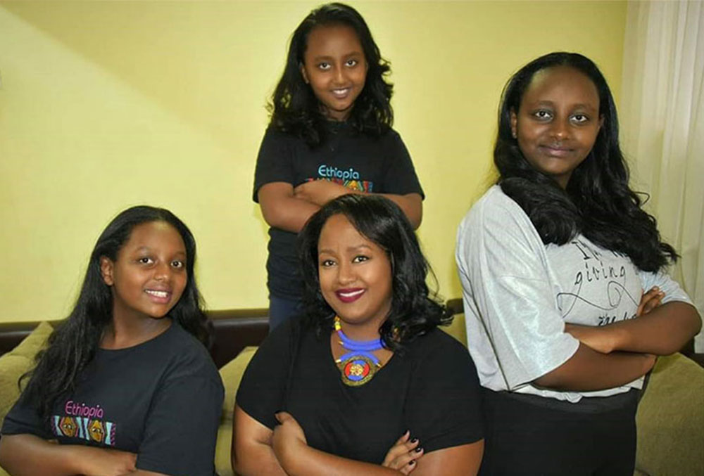 Sesnie with her three daughters