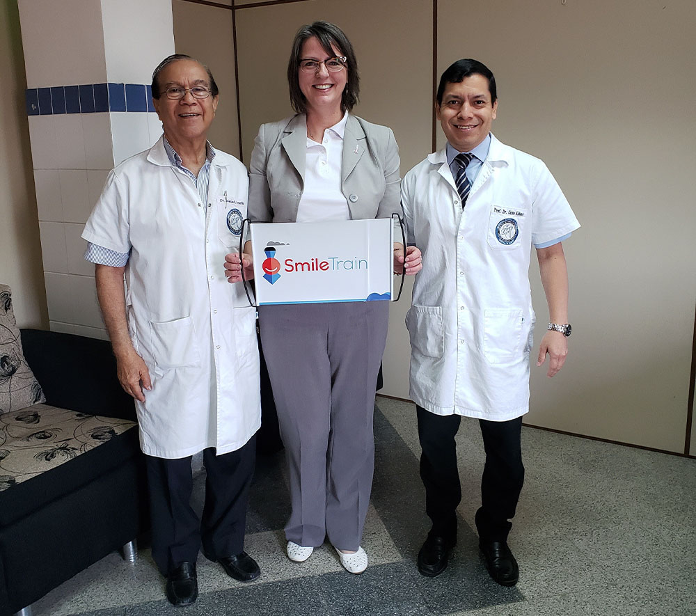 Silvia Backes with Drs. Jesus Amarilla and Dr. Aldana at a training for free cleft lip and palate surgery in Asuncion, Paraguay.