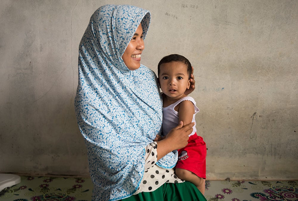Zawata with mother after free cleft treatment in Indonesia
