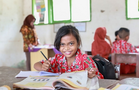 Aira smiling in school