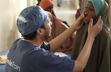 A doctor checking on patient in Somalia