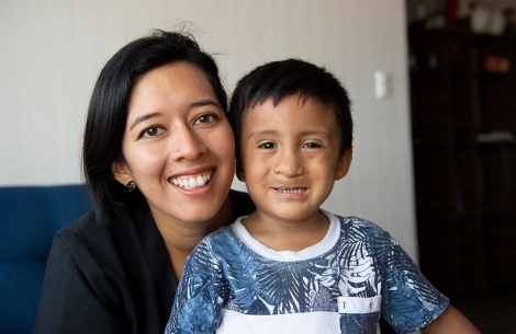 Evelyn poses with speech patient Anthony