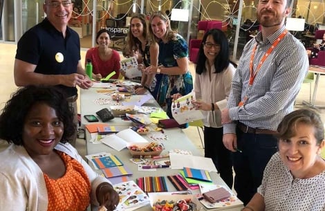 group making get well cards for Smile Train patients