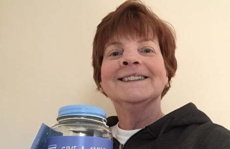 Patricia Simon with collection jar