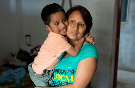 Anghelo hugs his mother after free cleft surgery in Peru