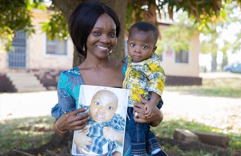 Annointed with his mother, Favour, after his cleft surgery.