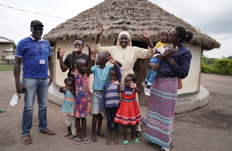 Sister Najjuka celebrates with a patient's family