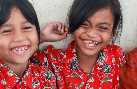 two young girls smiling