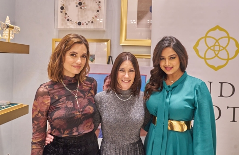 Torrey DeVitto, Susie Schaeffer, and Harnaaz Sandhu posing together at Kendra Scott on Giving Tuesday