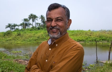 ABM Mobasher Hossain smiling