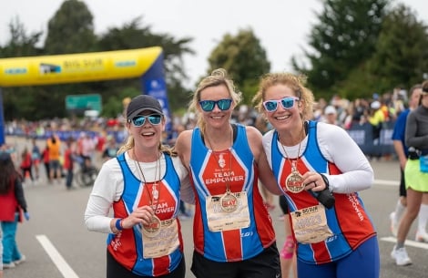 3 women on team EMPOWER running in Big Sur Relay 2023