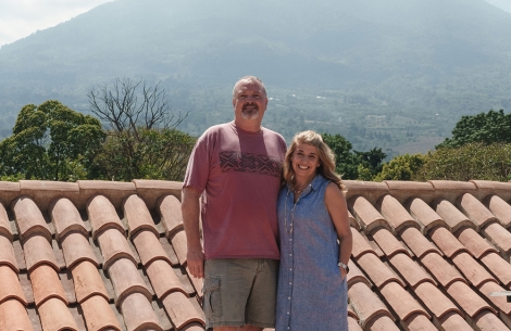 Seth and Becca standing on a rooftop in Guatemala