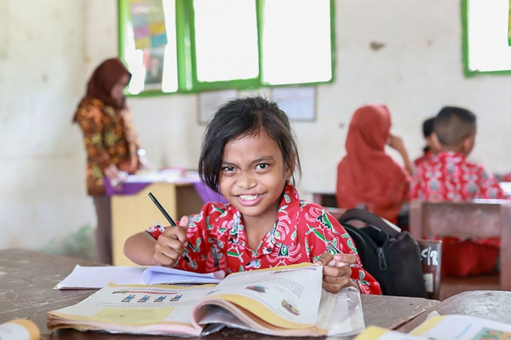 Aira smiling in school