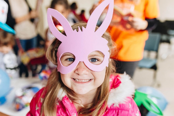 girl wearing a bunny mask