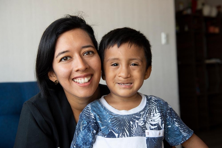 Evelyn poses with speech patient Anthony