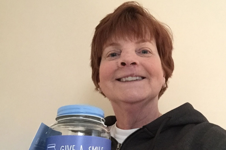 Patricia Simon with collection jar
