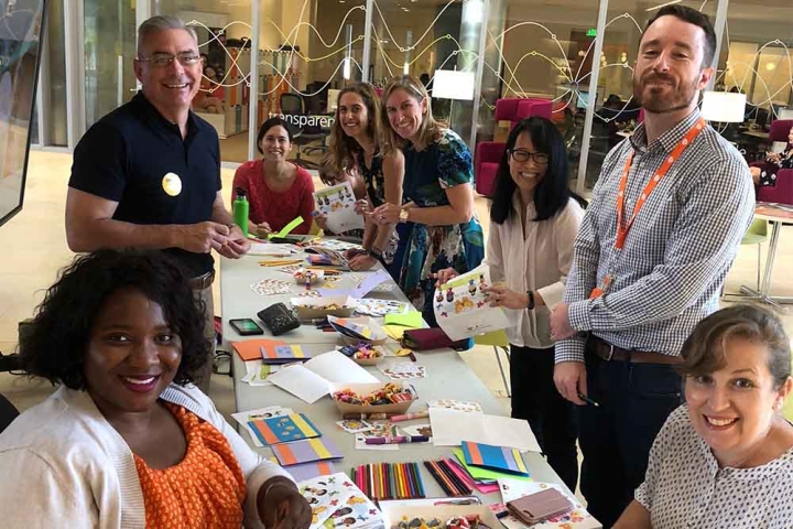 group making get well cards for Smile Train patients