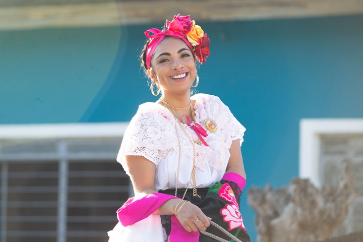 Adahara, on horseback, smiling in the Mexican sun after cleft treatment.