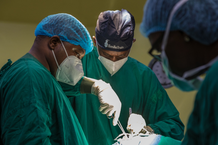 Surgeons performing surgery