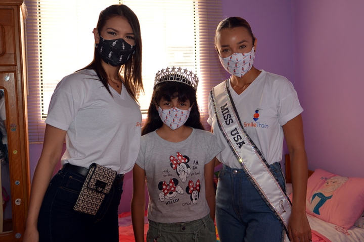 Miss Peru Yely Rivera, Smile Train patient Estephany, and Miss USA Elle Smith