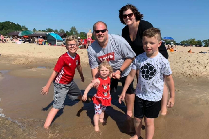 Monica Bush with her family at the beach