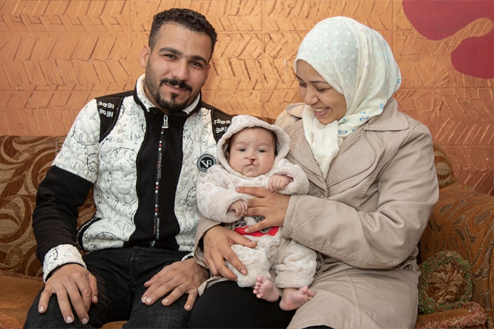 Mustafa with his parents before cleft surgery