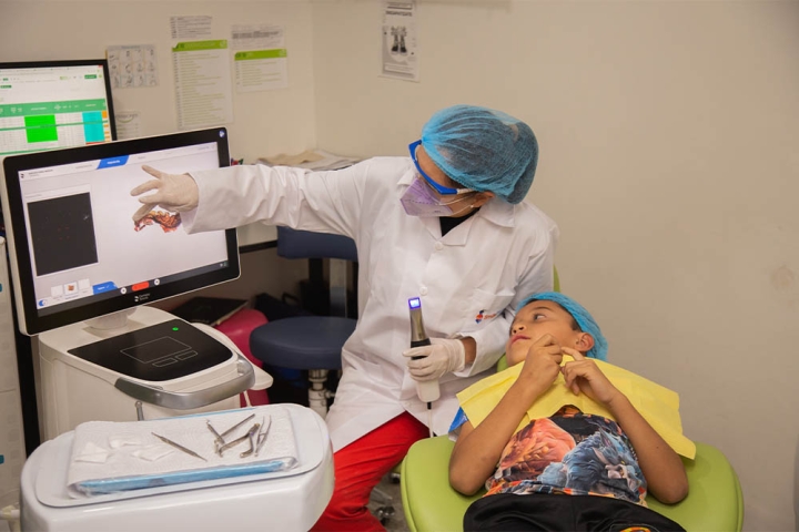 Partner working with a Smile Train patient