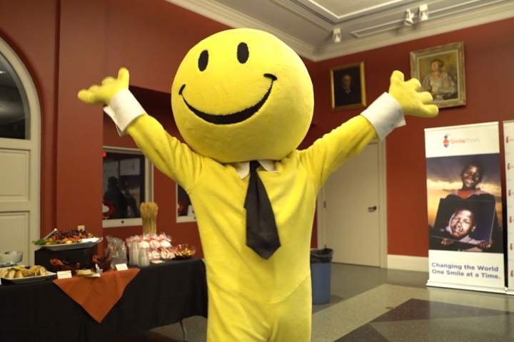 Smiley with their hands in the air at Worcester Historical Museum