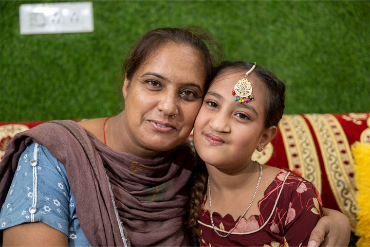 Bhumika smiling with her mother Jyoti after her cleft surgery