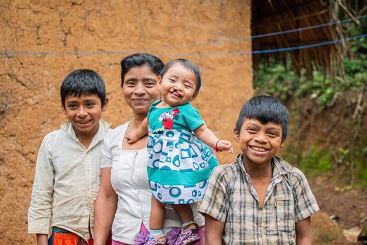 Mirian a Smile Train Patient with her mother and two brothers