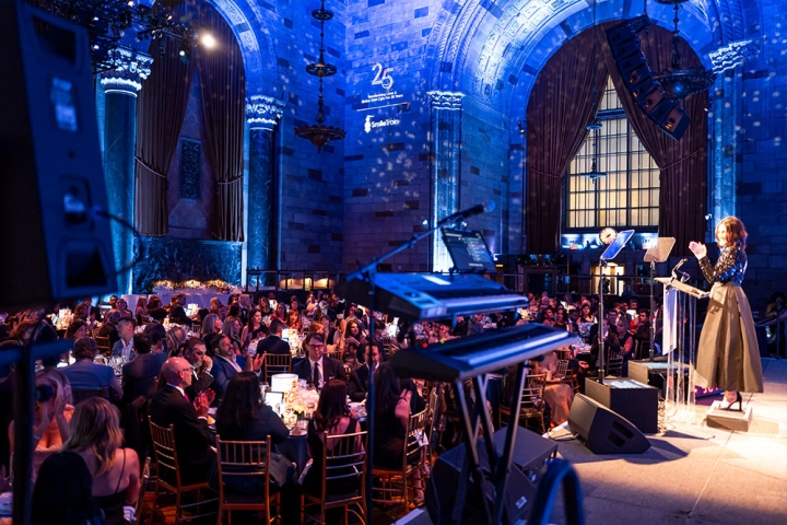 Cipriani 42nd St in Manhattan decorated for Smile Train’s 25th-Anniversary Gala as Susie Schaefer speaks