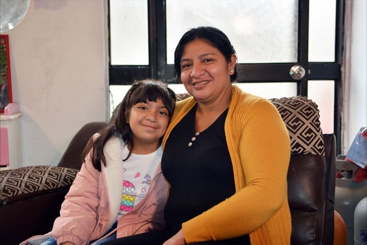 Bhania and Yolanda smile together for the camera