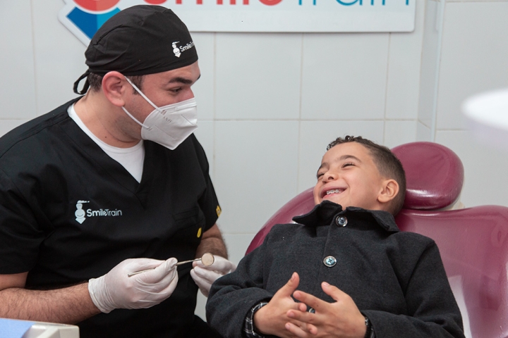 Smile Train partner dentist with Smile Train patient