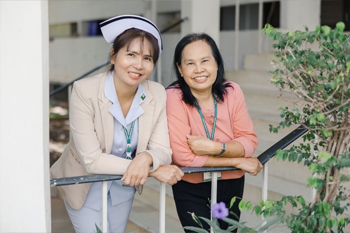 Nurses Yupin and Suteera share a smile
