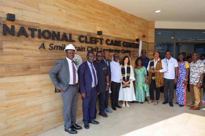 Smile Train staff and partners stand outside the launch of the new Cleft Leadership Center in Kumasi, Ghana