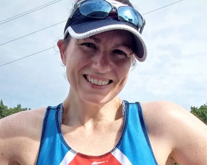 Jenn Ashton in Smile Train running gear