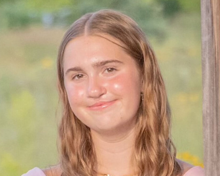 Riley Fox smiling headshot
