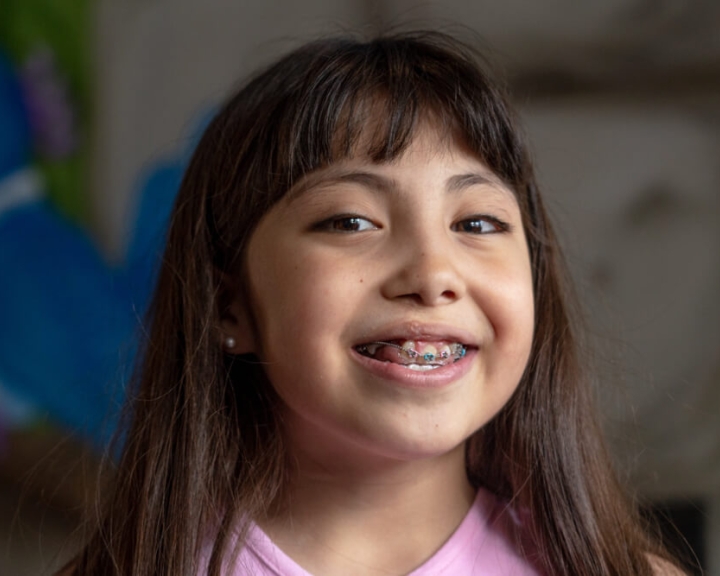 Milagros Smiling in Braces