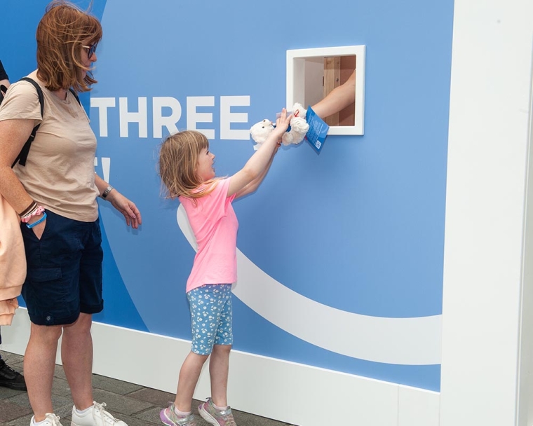 Child gets gift from billboard