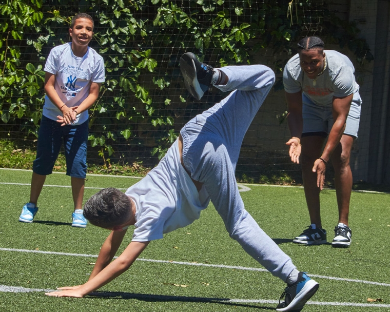 Kenyan Drake watching a Smile Train patient breakdance