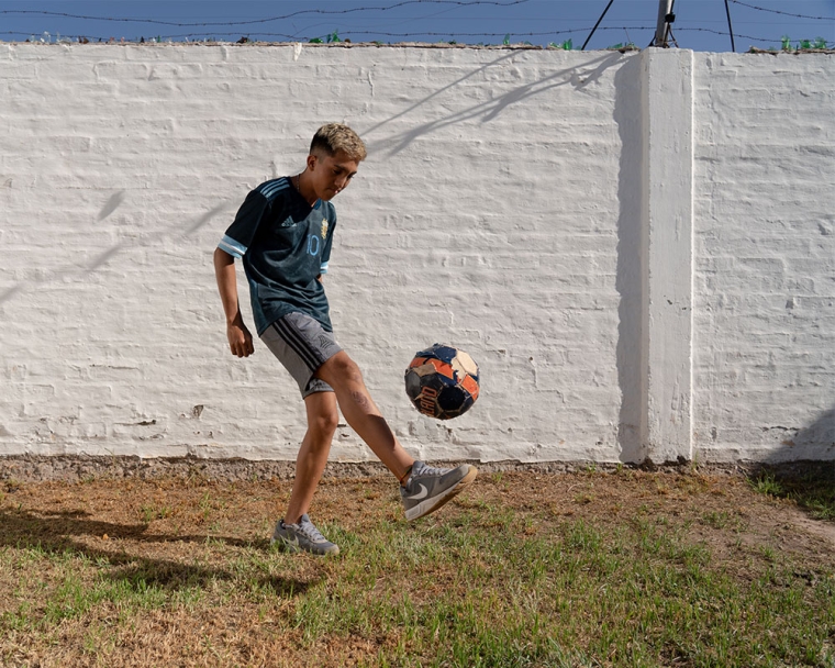 Federico volleying a soccer ball