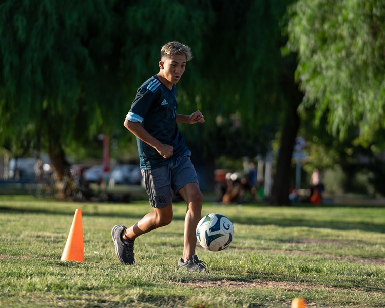 Federico doing drills on the soccer field