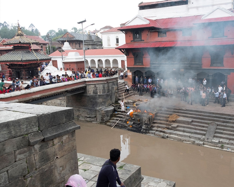 Fire and smoke near a river