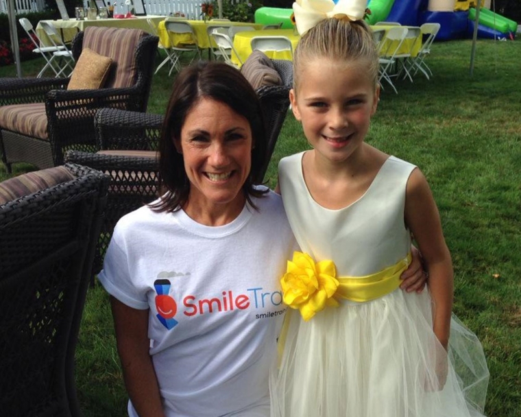 Ella smiling with Smile Train President and CEO Susannah Schaefer