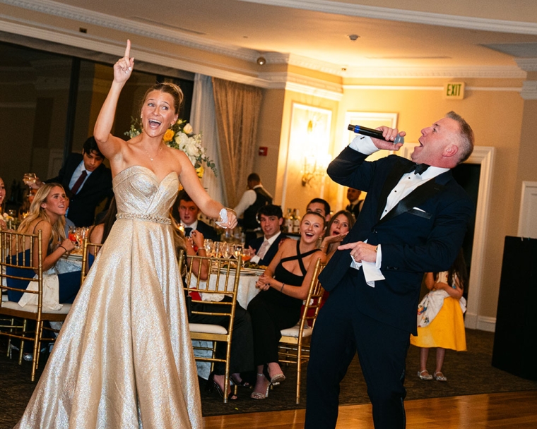 Ella singing with her father at her 16th birthday party