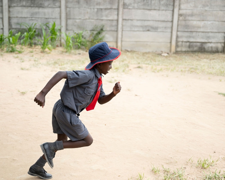 David smiling and sprinting