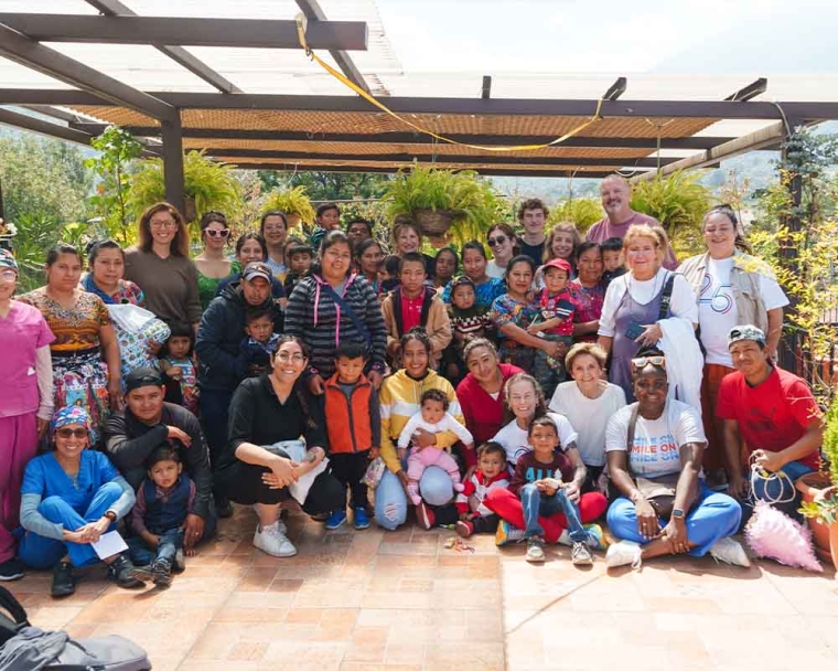 Sue Hoover smiling with the Journey of Smiles Guatemala group